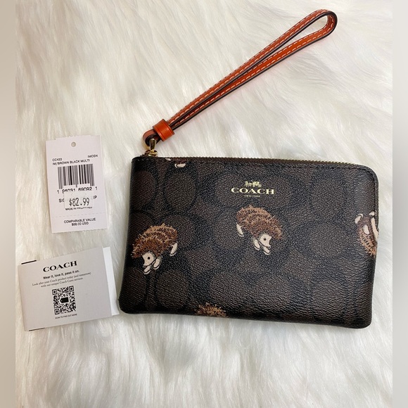 Coach Bags Coach Corner Zip Wristlet In Signature Canvas Hedgehog